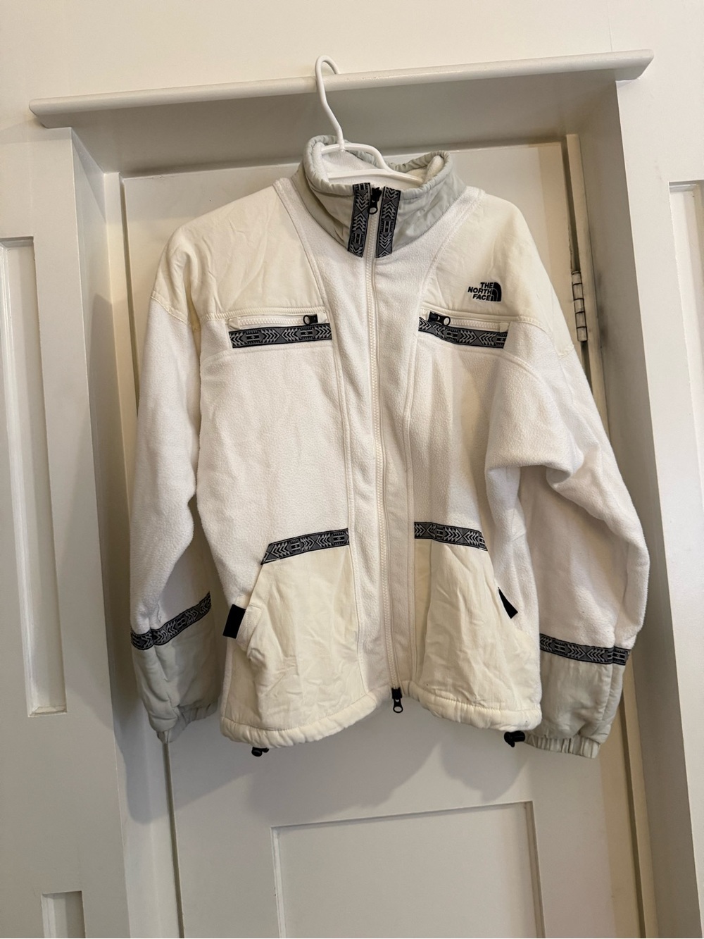 The North Face Women’s White Fleece Puffer Jacket with black Trim